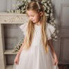 Biała sukienka z wyszywanym wzorem, dla małej dziewczynki.