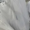 sukienka biala dlugi tiulowy rekaw wyszywana drobna gora