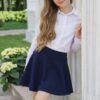 Granatowa spódniczka rozkloszowana dla dziewczynki, idealna na codzienne stylizacje.