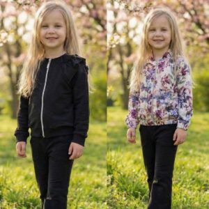 Zestaw dwóch bluz z długimi rękawami i spodniami dla dziewczynki, w tym czarna bluza z falbankami oraz kolorowa bluza w kwiaty.